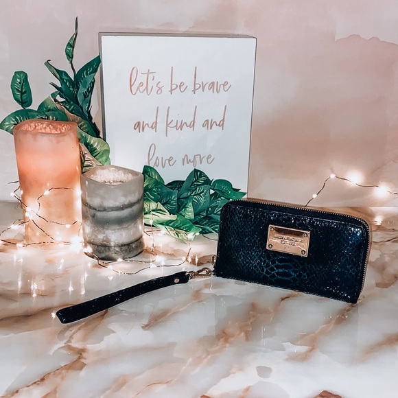 Michael Kors Handbags - *SOLD* Michael Kors Black Python Zip Wallet